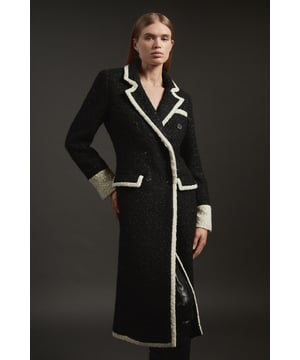 Feel elevated no matter the weather in our midi length coat, featuring a traditional, double breasted design, and contrasting trim details. Wear it over any outfit, whether heading out for dinner or to the office. Texture Metallic Contrast Tipped Double Breasted Tailored Midi Coat Flattering Straight Silhouette Classic Double Breasted Design V Neckline Unique Cape Accent Contrast Detailing Midi LengthShop this seasons women's long coats and jackets or browse the full collection of coats and jackets now.