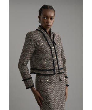Elevate your evening wardrobe with a tailoredjacket, made with boucle, contrasted with a traditional check pattern and metallic button detailing. Style it with tailored trousers or the matching pieces and strappy heels for an occasion look that is guaranteed to turn heads wherever you step. Petite Wool Mix Boucle Tailored Cropped Collarless Jacket High Quality Wool Boucle Fabric Metallic Button Detailing Classic Check Pattern V Neckline Flattering Fitted Silhouette Matching Pieces Sold Separately Expertly designed for those 5'3" and under, our Petite pieces are perfectly proportioned for a smaller frame using shorter lengths.