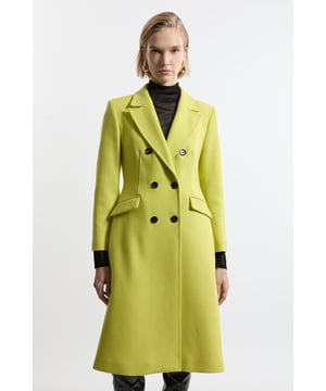 Feel elevated no matter the weather in our midi length coat, made in high quality, thick Italian wool, featuring a fitted silhouette and double breasted buttons. Wear it over any outfit, whether heading out for dinner or to the office. Premium Italian Manteco Wool Fitted Tailored Midi Coat High Quality Italian Manteco Wool Fabric Flattering, FItted Silhouette Double Breasted Button Detailing Formal, Collared Neckline Expertly designed for those 5'3" and under, our Petite pieces are perfectly proportioned for a smaller frame using shorter lengths.Shop this seasons wool coats or browse the full collection of coats and jackets now.
