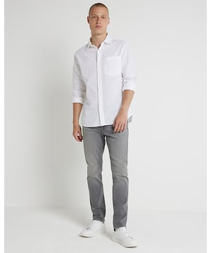 Skinny fit, Denim fabric, Classic 5 pockets, Belt loops, Button fastening, Cotton for this product has been more responsibly sourced
