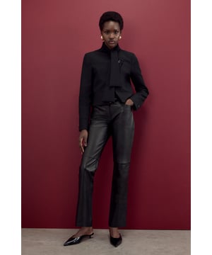 Presenting The Founder: Elevated collection, in collaboration with Karen Millen OBE. Enjoy Karen Millen legacy designs, with timeless silhouettes and classic details that are forever on-trend and ready to wear.  Experience sleek tailoring in a pair of slim leg trousers, featuring a figure skimming fit and a comfortable high waistline. The real leather makes for an elevated approach, so style it with a shirt, blazer, and heels for a dressy look perfect for office days and formal events, or with a T-shirt and trainers for a more laid back approach. The Founder Leather Slim Leg Trousers High Quality, Sleek Real Leather Comfortable High Waistline Flattering Slim Leg Fit Pocket Accents