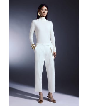A true contender for the perfect work-to-weekend trousers, this polished pair is tailored for sleek effect. Elegantly equipped with slip pockets, a fly fastening and a relaxed fit, these plush tailored trousers breathe new life into any well-kept capsule collection.TailoredRelaxed FitRegular LengthSlip pockets