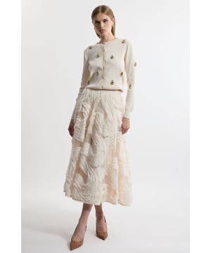 Step into a new season with the latest collection by Lydia Millen. A testament to Lydia's timeless style, By Lydia: Autumn Winter '24 ensures a seamless transition into cold-weather dressing. Feel formal in our tall prom skirt, with a universally flattering flared silhouette, and swirled, textured embroidery which brings an elevated level of intrigue. Style this piece with a blouse or corset top and dancefloor-friendly block heels. Lydia Millen Tall Textured Ruffle Midaxi Woven Prom Skirt Statement Textured Fabric Comfortable, High Waistline Formal, Flowing Silhouette Pocket Features Zip Back Fastening Expertly designed for those 5'10" and above, our Tall pieces are perfectly proportioned for a taller frame using longer lengths.