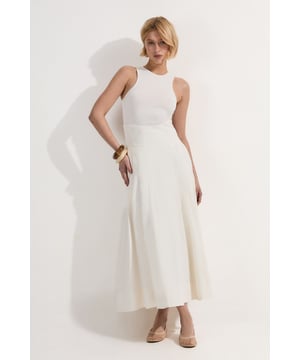 Tailored full skirted design for a flattering silhouette Midaxi length offering versatile styling options High-waisted fit accentuating the natural waistline Pleated detailing adds texture and movement Side pockets for practicality and a relaxed look  This Karen Millen skirt radiates elegance with its tailored full skirted design and midaxi length. Perfect for formal occasions, it offers a sophisticated yet contemporary look. The high-waisted fit elongates the silhouette, while the pleated detailing adds a touch of drama and movement. Style it with a fitted blouse and strappy heels for a polished ensemble at weddings or races. For a more casual take, pair it with a crisp white t-shirt and ballet flats. The versatile nature of this skirt allows for endless styling possibilities, making it a wardrobe staple for various events. Its timeless design ensures you'll reach for it season after season, whether you're attending a garden party or a formal dinner.