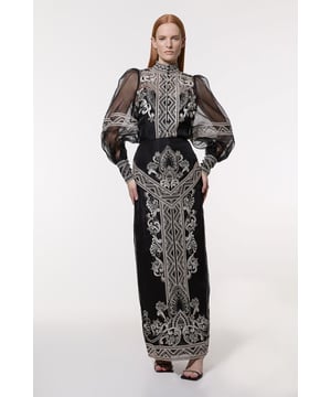 Experience head turning occasion wear in our maxi skirt, featuring a universally flattering straight silhouette, and a high waistline. The embroidered design and sheer overlay make a statement, perfect for catching eyes all night long. Style this piece with strappy heels for an occasion look that goes from wedding guest days to gala evenings. Embroidered Organdie Woven Maxi Skirt High Quality Organdie Fabric High Waistline Flattering Straight Silhouette Subtle Sheer Overlay Embroidered Geometric Design Zip Back FasteningDiscover our collection of occasion wear or browse our range of women's occasion dresses now.