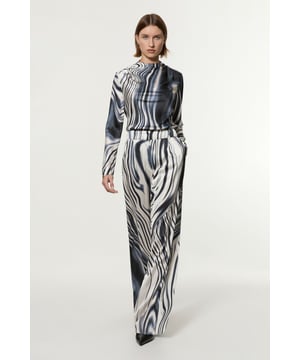 Make a striking statement with these Karen Millen high-waist trousers. The mesmerising graduated stripe pattern creates a captivating visual effect, perfect for those who appreciate bold, contemporary design. Crafted from smooth viscose satin, these trousers offer both comfort and sophistication. The high-waist cut elongates the silhouette, while the wide-leg style adds a touch of drama to your ensemble. Ideal for formal occasions, pair these trousers with a crisp white blouse and pointed-toe heels for a polished look. Alternatively, dress them down for a daytime outfit by teaming with a fitted turtleneck and elegant flats. The versatile 82cm length allows for effortless styling with various shoe options.    Eye-catching graduated stripe pattern Luxurious viscose satin fabric Flattering high-waist design Elegant wide-leg silhouette Versatile 82cm length
