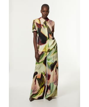 Experience elevated tailoring in a pair of tall wide leg trousers, featuring a flattering, relaxed fit and a comfortable high waistline, as well as a unique print. Style them with the matching top for a co-ordinating look, or with a T-shirt and loafers for a more laid back approach. Printed Satin Woven Wide Leg Trouser High Quality Satin Fabric Comfortable High Waistline Flattering, Extreme Wide Leg Fit Vibrant, Abstract Print Pocket Accents Matching Top Sold SeparatelyDiscover our collection of occasion wear or browse our range of women's occasion dresses now.