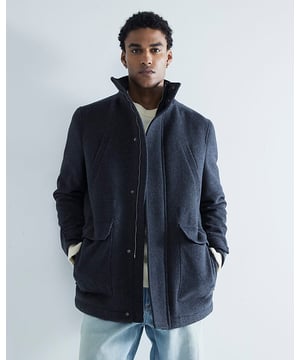 Regular fit, Wool fabric, Chest and waist pockets, Collared, Long sleeves, Zip fastening