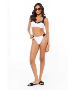 Striking contrast design for a bold beach look
        Comfortable, stretchy fabric for all-day wear
        Mid-rise fit with moderate coverage
        Versatile style suitable for various body types
        Pairs perfectly with matching bandeau top
    
    Make a splash this summer with our eye-catching contrast bikini bottom. This chic piece combines style and comfort, featuring a flattering mid-rise fit and moderate coverage that suits a variety of body shapes. The stretchy fabric ensures a snug yet comfortable fit, perfect for lounging by the pool or taking a dip in the sea. For a coordinated look, pair with the matching bandeau top and accessorise with oversized sunglasses and a wide-brimmed hat. Whether you're jetting off to a tropical paradise or enjoying a staycation at a local lido, this versatile bikini bottom is a must-have for your summer wardrobe. Its timeless design makes it ideal for mixing and matching with other swimwear pieces, allowing you to create multiple looks for your beach holidays or poolside relaxation.