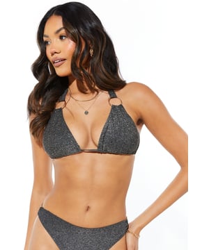 Stylish halterneck design for enhanced support
        Eye-catching ring detail adds a touch of glamour
        Adjustable ties at neck and back for a customised fit
        Metallic yarn blend fabric for a subtle shimmer effect
        Matching bikini bottoms for a coordinated beach look
    
    Make a splash this summer with our Ring Detail Halterneck Bikini Top. This chic swimwear piece combines style and comfort, perfect for your next beach getaway or poolside lounging. The halterneck design offers excellent support, while the adjustable ties allow you to achieve your ideal fit. Pair with the matching bottoms and accessorise with oversized sunglasses and a wide-brimmed hat for a look that exudes holiday glamour. Whether you're taking a dip in the sea, sunbathing on the sand, or sipping cocktails at a beach bar, this versatile bikini top will ensure you look and feel fabulous. For a complete ensemble, throw on a lightweight kaftan and slip into some stylish sandals when it's time to leave the beach.