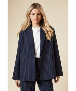Oversized double-breasted design for a relaxed, on-trend silhouette
        Pinstripe pattern adds a touch of sophistication
        Collared neckline for a classic blazer look
        Functional front pockets for practicality
        Versatile woven fabric with a hint of stretch for comfort
    
    Embrace effortless chic with this oversized double-breasted blazer from Dorothy Perkins. Perfect for the fashion-forward woman who values both style and comfort, this jacket is a versatile addition to your wardrobe. The relaxed fit allows for easy layering, making it ideal for various casual occasions. Style it with a crisp white tee and wide-leg trousers for a polished brunch look, or throw it over a simple dress for an impromptu coffee date. The pinstripe pattern adds a subtle sophistication, allowing you to transition seamlessly from day to night. For a trendy ensemble, pair with trainers and your favourite jeans for weekend errands or family gatherings. This blazer is the perfect companion for those who appreciate a blend of classic tailoring and contemporary oversized trends.
