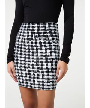 Check out this season must must-have mini skirt! A must for the colder months, team with tights and black boots for the ultimate AW look!