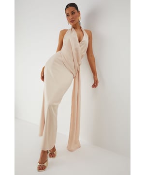 Luxurious satin fabric with a subtle sheen that catches the light beautifully
        Elegant halterneck design with an open back for a striking silhouette
        Sophisticated draped detailing along the side creates flattering movement
        Floor-sweeping maxi length with a daring side split for ease of movement
        Figure-enhancing fit with a smooth lining for comfort and confidence
    
    Command attention at your next special occasion in this show-stopping satin maxi dress from MissPap. The halterneck design frames your dcolletage whilst the open back adds a touch of drama to your ensemble. The expertly crafted side draping creates a flattering silhouette that flows with your every move, whilst the daring side split offers both practicality and allure. Style with strappy metallic heels as seen on our model and statement earrings for a head-turning look perfect for weddings, formal events or graduation ceremonies. For cooler evenings, pair with a delicate shawl or a tailored blazer to maintain the dress's elegant lines. This versatile piece transitions effortlessly from daytime celebrations to evening affairs, ensuring you remain the focal point of any occasion.