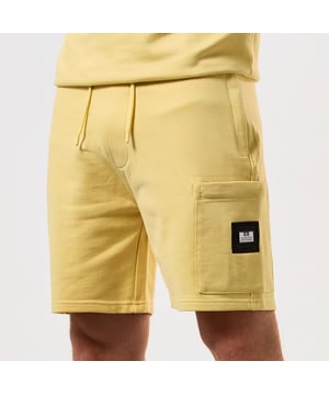Heren Weekend Offender Hawkins Classic Fleece Shorts in geel.- Comfort rib tailleband met extern koord.- Opgezette beenzak met verborgen ritssluiting met versterkte stiksels en webbing detail.- Zijzakken met verborgen ritssluiting.- Achterzak met webbing detail en verborgen drukknoopsluiting.- Afneembare WO badge op beenzak.- Normale pasvorm.- 100% Katoen.- Ref: STSS2401YEL