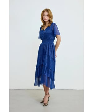 Our sizes run large, Ideal for dazzling at special events. The silvery fabric adds a sparkling and attractive atmosphere to the dress. The layered design adds movement and volume to the dress. The V-neck detail elegantly emphasizes the décolleté. It is a perfect option for both special invitations and night events.