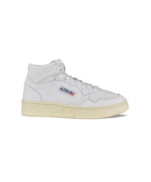 Sneakers altas Autry  Medalist Mid  de piel blanca flexible.Parche del logotipo en el exterior. Lengüeta con parche del logotipo.Suela de caucho efecto amarilleado con logotipo en relieve.  Cierre con cordones.Puntera redonda perforada.100% cuero.