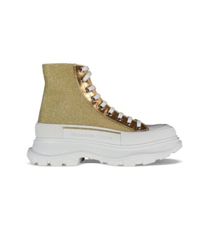 Sneakers altas Alexander McQueen Tread Slick.Lona dorada con efecto brillo.Inserciones de cuero metálico dorado.Puntera redonda con inserción de goma.Logotipo en el mostrador y en la lengüeta.Cierre de cordón plano blanco.Suela de goma blanca sobredimensionada con la firma.Made in Italy.