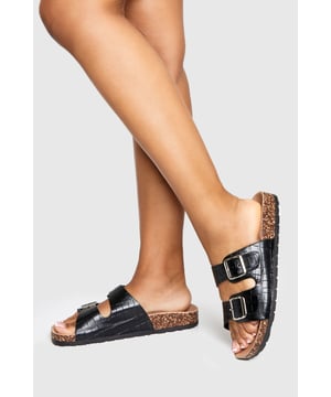 We'll make sure your shoes keep you one stylish step ahead of the crowdWhether you're keeping it simple in sliders, living the high life in heels or joining the fash pack in flatforms, you'll be heading to shoe heaven with our fashion-forward footwear collection. Boots are your day-to-night bestfriend, giving a floral dress&nbsp;that tough twist - add a biker jacket for even more attitude. Find your summer feet in jelly sandals and enjoy balmy nights in block heels.