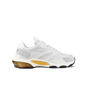 Weiße und gelbe Valentino Bounce Sneakers.Weißer Wildledereinsatz mit schwarzem  Valentino Garavani  Logo.VLTN-Logo auf der Zunge.Gummisohle mit pulverisiertem Effekt.Made in Italy.