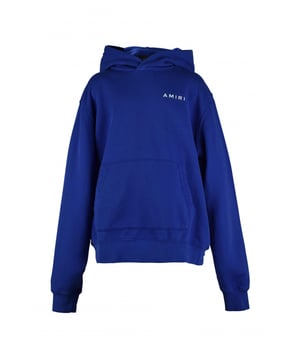 Amiri sweatshirt met capuchon van blauw katoen.Wit logo gedrukt op de borst.Rode bottenprint op de achterkant.Geribbelde randen.Kangoeroezak.Gemaakt in Italië.