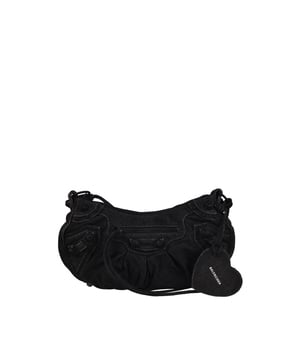 Bolso Balenciaga Cagole en lona vaquera negra.Efecto desteñido.Adorno de strass negro.Bandolera ajustable.Bolso de hombro.Cierre principal con cremallera.Bolsillo delantero con cremallera.Bolsillo trasero con cremallera.Espejo extraíble en forma de corazón.Dimensiones: 33 x 17 x 8 cm.Made in Italy.