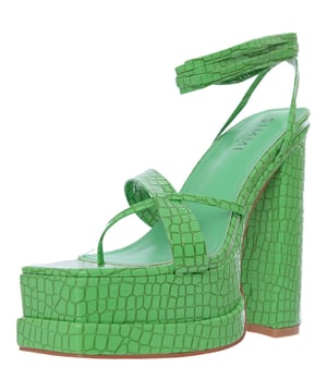 Step into bold style with the Simmi London Women's Green Platform Heeled Sandals. These statement heels feature a vibrant green hue, adding a pop of color to any outfit. The platform design not only enhances your height but also offers added comfort by reducing foot pressure, making them ideal for long evenings out. The sleek strap design ensures a secure and stylish fit, while the chunky heel provides stability and a contemporary edge. Perfect for pairing with dresses, skirts, or jeans, these sandals bring a fresh, modern twist to your footwear collection.

Bold green color for a vibrant, eye-catching look

Platform design for added height and comfort

Secure strap design for a comfortable, stylish fit

Chunky heel for added stability and fashion-forward flair

Ideal for evening events, parties, or summer outings

The Simmi London Women's Green Platform Heeled Sandals are the perfect combination of striking style and comfort, making them a must-have for those who want to make a statement with every step.