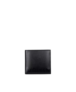 Cartera Alexander Mcqueen en cuero negro liso.Logotipo de la firma en contraste en la parte delantera.Ranuras para tarjetas de crédito y una ranura central.Tamaño: 11 cm x 10 cm.100% cuero.Made in Italy.