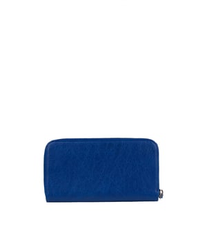 Balenciaga portemonnee van elektrisch blauw leer.Decoratieve studs aan beide uiteinden.Geldvak met ritssluiting aan de binnenkant.Kaartvakken.Gemaakt in Italië.