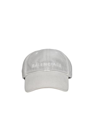 Gorra Balenciaga.Tejido blanco efecto vintage.Logotipo Balenciaga blanco bordado en la parte delantera.Cinta de velcro ajustable en la parte trasera.Ojales bordados en la parte superior.100% algodón.Made in Italy.
