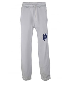 Amiri joggingbroek van wit katoen.Paars MA-logo gedrukt op de voorkant.Elastische tailleband met trekkoorden.Elastische enkels.Zijzakken.Eén achterzak.Zwarte logopatch op de achterkant.Gemaakt in Italië.
