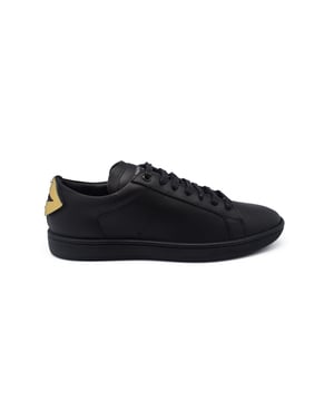 Saint Laurent Court Classic SL/01 sneakers van zwart leer. Lippen op de achterkant van slangenleer. Rubberen zool. Gemaakt in Italië.