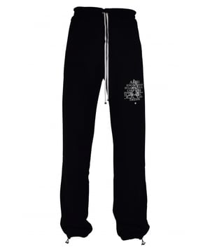 Pantalón jogging Amiri de algodón negro.Estampado gráfico Precious Memories blanco en una pernera.Cintura elástica con cordones blancos.Bolsillos laterales.Un bolsillo trasero.Tobillos elásticos con cordones.Made in Italy.