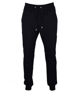 Zwart joggingpak van Balmain-katoen.Achterzak met witte logopatch.Geribde inzetstukken boven de knieën.Elastische taille met trekkoorden.Geribbelde randen.Zijzakken.