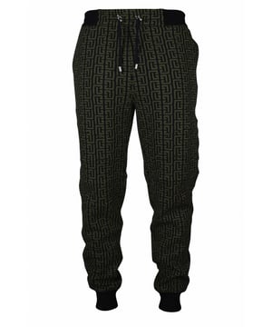 Balmain kaki en zwarte joggingbroek.Balmain monogram.Geribbelde gebreide tailleband met trekkoord.Opgezette achterzakken.55% katoen, 45% polyester.