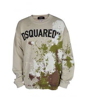 Sudadera Dsquared2 beige con manchas de pintura.Múltiples manchas de pintura de color caqui, marrón y blanco en la parte delantera y trasera.Logotipo negro  Dsquared2  en la parte delantera.Bolsillo tipo canguro en la parte delantera.Cuello redondo.100% algodón.Made in Italy.