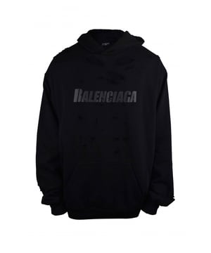 Balenciaga Kapuzen-Sweatshirt aus schwarzer Baumwolle.  Graues gedrucktes Logo in der Mitte.Zerrissener Effekt auf dem gesamten Oberteil.Gerippte Ränder an den Kanten.Kängurutasche.Lange Ärmel. Oversize-Schnitt.Große Größe.