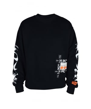Jersey Heron Preston de algodón negro.Manga larga con estampado gráfico blanco.Inserciones de parches con logotipos en la parte delantera.Parche blanco con el logotipo en la espalda.Escote redondo.Dobladillo recto.100% algodón.