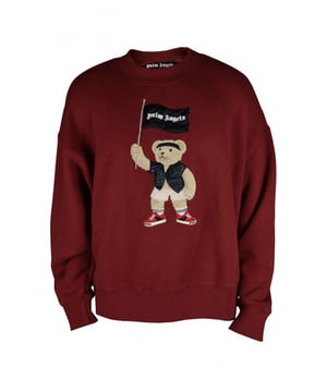 Palm Angels trui.Rode kleur. Lange mouwen.Geribbelde gebreide kraag, manchetten en zoom. Berenmotief met een vlag met logo. 100% katoen.Gemaakt in Italië.