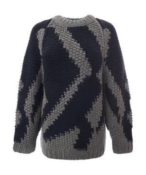 70% recycled cashmere, 25% cashmere, 5% merino wool. A geometric pattern provides visual intrigue to Raey's jumper, hand-knitted from a blend of soft cashmere and extra fine merino wool