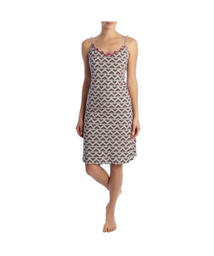The women's summer nightgown with straps is the perfect garment for enjoying warm nights in style and comfort. Designed specifically for the summer season, this nightgown combines lightness, softness, and an elegant design that ensures freshness and comfort during rest hours.

 Main Features:
 Cool & Light Design: This women's summer nightgown features an adjustable spaghetti strap design for the hottest nights.

 Breathable Material: Made with lightweight and breathable materials, women's nightgowns ensure excellent air circulation, keeping your skin cool and comfortable all night long.

 Comfort and Softness: Cotton ensures a soft texture to the touch, offering a pleasant feeling on the skin and facilitating restful sleep.

 Elegant Style: With carefully designed details, such as decorative piping or summer prints, this women's summer nightgown adds a touch of style and femininity to your sleepwear.

 Relaxed Fit: Cut to allow for freedom of movement, this camisole provides a comfortable, loose fit, perfect for unrestricted sleep.

 The women's summer nightgown is the ideal choice for those seeking comfort and style on warm nights. With its lightweight, breathable, and elegant design, this nightgown guarantees a pleasant and relaxing experience every time you wear it, providing the coolness and softness needed for a restful sleep.
 Composition: 100% Cotton
 Care:
Washing machine safe at maximum temperature of 30º.
 It does not resist bleach or any other chlorate.
 It does not resist ironing.
 Does not withstand dry cleaning.
 It does not resist the dryer.