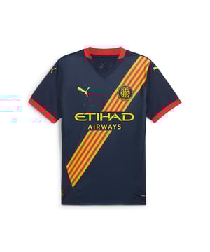 PRODUCT STORY: Gear up and show your allegiance to Girona FC with the official 24/25 Away Jersey. It features mesh panels and moisture-wicking dryCELL tech to keep you feeling cool and comfortable. FEATURES & BENEFITS: dryCELL: Performance technology designed to wick moisture from the body and keep you free of sweat during exercise; As part of the RE:FIBRE program, this garment is made of at least 95% recycled material from textile waste and other used materials. DETAILS: Regular fit; 170 gsm, Jacquard; Mesh inserts; V-neck; Short sleeves; Official team branding.  Our model is 183 cm tall and is wearing size M UK.