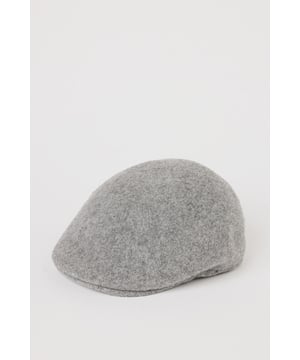 Crafted with wool for exceptional warmth and comfort
        Brushed texture adds subtle sophistication to the classic flat cap design
        Streamlined silhouette with a structured shape that maintains its form
        Versatile one-size design suitable for everyday wear
        Discreet side vent detail for improved fit and comfort
    
    This timeless flat cap from Burton brings traditional British style to your casual wardrobe. The brushed finish creates a refined texture that pairs brilliantly with autumn and winter outfits. Style with a classic button-up shirt and chinos for weekend pub lunches, or throw on with a casual jumper and jeans for sporting events. The neutral grey tone makes this cap exceptionally versatile, complementing both country walks and city outings with equal measure. For cooler days, layer with a wool overcoat and Chelsea boots for a distinguished look that balances comfort and style. This flat cap offers that perfect finishing touch to elevate your casual ensembles without appearing overly formal - an essential accessory for the modern British gent who appreciates heritage-inspired fashion.