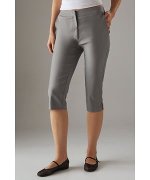 Tailored capri trousers with a sleek mid-calf length
        Clean waistband design for a smooth silhouette
        Practical side pockets for everyday essentials
        Versatile woven fabric with a refined finish
        Streamlined fit that flatters the feminine form
    
    These Warehouse capri trousers offer the perfect balance of comfort and style for the confident modern woman. The tailored fit creates a flattering silhouette that works beautifully for various casual occasions. Style them as shown with a relaxed oversized shirt or crisp white top for an effortlessly chic look. The versatile design makes these trousers ideal for family gatherings, weekend brunches, or casual office days. Pair with minimalist sandals for warmer days or ballet flats for a touch of elegance. The clean lines and thoughtful proportions reflect Warehouse's signature edgy yet feminine aesthetic, making these capris a wardrobe essential that transitions seamlessly from day to evening. Perfect for city breaks or garden parties, these trousers offer both practicality and understated sophistication.