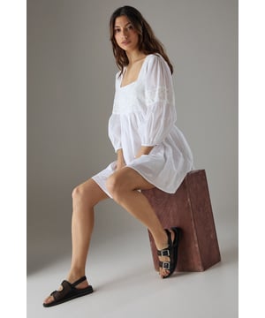 Distinctive double buckle design for adjustable fit and contemporary appeal
        Mesh detail adds breathability and textural interest to these versatile sandals
        Comfortable footbed construction provides all-day support
        Flat heel measuring between 0-2cm perfect for extended wear
        Secure straps with buckle fastenings ensure stability whilst walking
    
    These Faith Eleusine sandals combine practicality with modern design sensibility. The mesh detailing creates visual interest while maintaining breathability during warmer days. As shown, they pair beautifully with floaty summer dresses for a relaxed yet put-together daytime look. The double buckle feature allows for customisation to your foot shape, making these ideal for city explorations, garden parties, or casual family gatherings. The flat profile offers stability without sacrificing style, and the dark tone creates a versatile foundation for your summer wardrobe. Consider styling with cropped trousers and a linen shirt for weekend brunches, or with a casual midi skirt for shopping trips. These sandals will quickly become your go-to footwear for any casual occasion requiring both comfort and understated elegance.