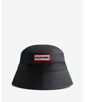 Featuring a polyurethane layer and a mesh lining, the Avon Bucket Hat is an everyday style statement for wet weather outfits. The shell has a lightweight water-resistant coating for protection while the bold Hunter silicon logo adds impact to any look.



Certified vegan
Water resistant
Lightweight coating for water repellency
Embroidered eyelets for ventilation
Silicon label



Material: 100% Polyester with polyurethane coatingLabel: 100% SiliconLining: 100% Polyester mesh
 
HXRU0037251