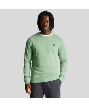 Geribde crewneck.Geribde manchetten en zoom.Heeft een retro-geïnspireerd driehoekig steekdetail bij de halslijn. Geborduurd logo op de borst.Normale pasvorm.