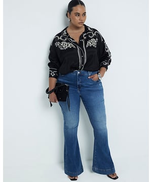 Plus collection, Mid rise, Flare design, Denim fabric, Belt loops, Classic 5 pockets, Button and zip fastening, Cotton for this product has been more responsibly sourced