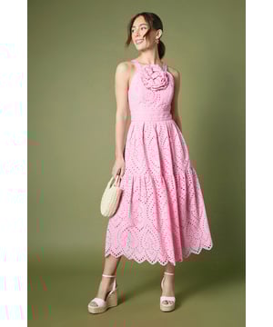 Striking disc sequin embellishment creates a dazzling light-catching effect
        Elegant fitted silhouette with a flattering midi length
        Statement floral corsage detail at the neckline adds sophisticated dimension
        Delicate scalloped hem with intricate eyelet pattern throughout
        Stylish cut-out back detail with secure fastening for a contemporary twist
    
    Make an unforgettable entrance at your next special occasion in this exquisite Coast midi dress. The fitted bodice gracefully highlights your silhouette while the eye-catching disc sequins catch and reflect light with every movement. Perfect for weddings or race day events, this dress combines timeless elegance with contemporary design through its distinctive floral corsage and modern cut-out back detail. Style with neutral platform sandals and a structured clutch as shown for daytime sophistication, or transition to evening events with metallic strappy heels and statement earrings. The scalloped eyelet pattern adds textural interest and a feminine touch that ensures you'll stand out for all the right reasons. This versatile piece works beautifully for garden parties, formal receptions or any event where you wish to convey refined glamour.