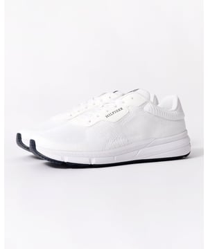 These low-tops put a contemporary spin on traditional styling with textured uppers, while signature tape on the midsoles adds a branded sign-off.Highlights• Polyester knitted upper• Polyester lining• Polyurethane, other textiles and thermoplastic rubber removable insock• EVA outsole• Lightweight• Signature tape on midsole• Hilfiger monotype logo embossed on side• Tommy Hilfiger branding• Tommy Hilfiger flag debossed on heelShape & fit• Low-top• Lace-upComposition & care• 100% polyester