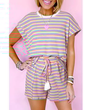 Our styles are designed with a trendy fitted look in mind following an international size standard. For the best fit we suggest choosing one size up from your usual. Be sure to check our sizing chart to find your perfect match!
  Classic shorts set for summer with a stylish striped print
  Crew neck t
  shirt with a relaxed fit
  Shorts with a tasseled drawstring
  Breathable fabric for all
  day comfort
  Versatile set perfect for casual outings or lounging at home
  Effortlessly chic for a relaxed look
Material: 95% Cotton 5% Elastane